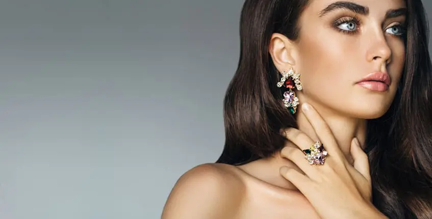 Jewelry Connection Dalton GA, beautiful woman wearing elegant ring and earrings